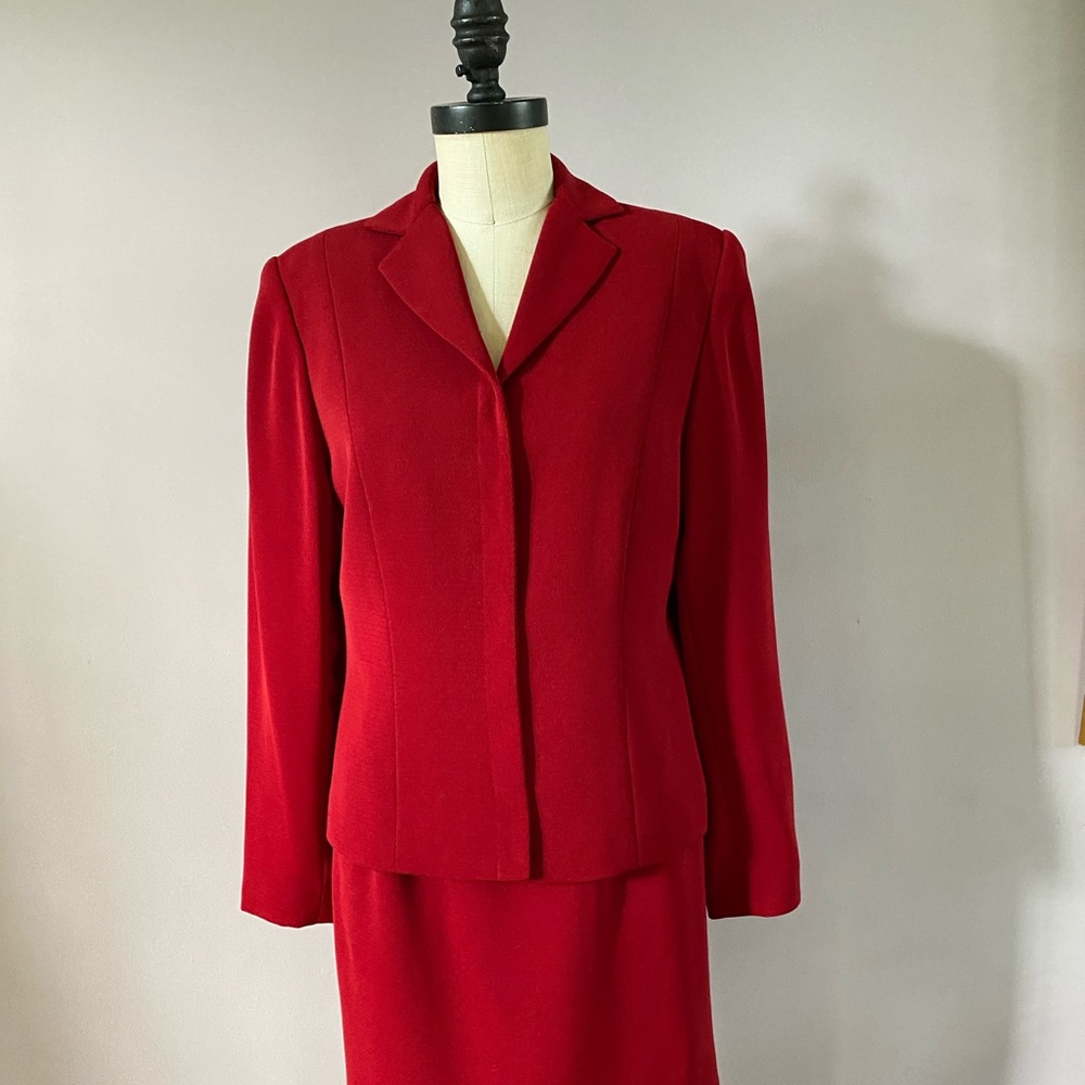 Vintage Travis Ayers deep red suit with a side slit pencil skirt. Size 4.